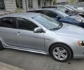 Серый Мицубиси Лансер, объемом двигателя 2 л и пробегом 176 тыс. км за 8488 $, фото 1 на Automoto.ua