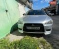 Серый Мицубиси Лансер, объемом двигателя 2 л и пробегом 250 тыс. км за 5750 $, фото 1 на Automoto.ua