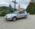 Сірий Міцубісі Lancer, об'ємом двигуна 1.59 л та пробігом 205 тис. км за 4350 $, фото 1 на Automoto.ua