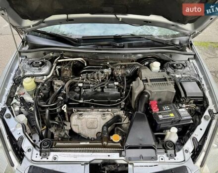 Сірий Міцубісі Lancer, об'ємом двигуна 1.58 л та пробігом 138 тис. км за 4990 $, фото 32 на Automoto.ua