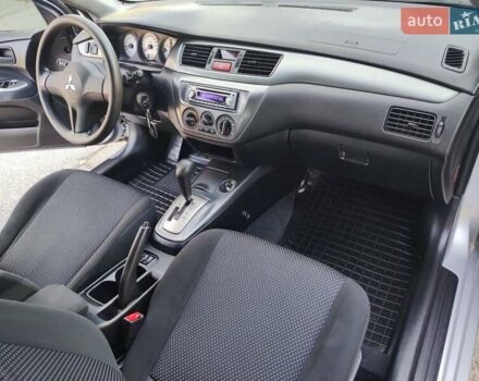 Сірий Міцубісі Lancer, об'ємом двигуна 1.58 л та пробігом 122 тис. км за 6300 $, фото 34 на Automoto.ua