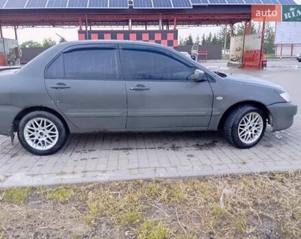 Мицубиси Лансер 2007 в Ивано-Франковске на Automoto.ua Серый Мицубиси Лансер, объемом двигателя 1.58 л и пробегом 238 тыс. км за 2950 $, фото 7 на Automoto.ua