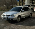 Сірий Міцубісі Lancer, об'ємом двигуна 1.6 л та пробігом 249 тис. км за 5100 $, фото 1 на Automoto.ua
