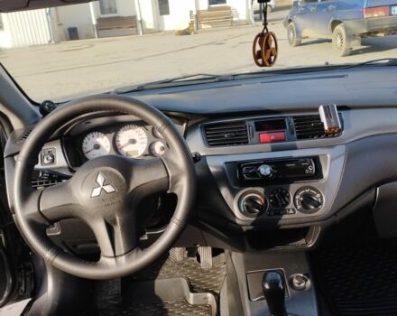 Сірий Міцубісі Lancer, об'ємом двигуна 1.6 л та пробігом 178 тис. км за 5464 $, фото 3 на Automoto.ua