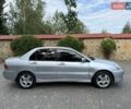 Серый Мицубиси Лансер, объемом двигателя 1.58 л и пробегом 241 тыс. км за 3750 $, фото 7 на Automoto.ua
