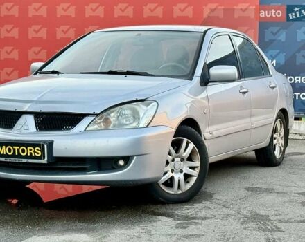 Сірий Міцубісі Lancer, об'ємом двигуна 1.6 л та пробігом 395 тис. км за 4900 $, фото 8 на Automoto.ua