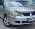 Серый Мицубиси Лансер, объемом двигателя 1.6 л и пробегом 298 тыс. км за 4100 $, фото 68 на Automoto.ua
