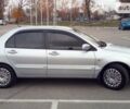 Сірий Міцубісі Lancer, об'ємом двигуна 1.6 л та пробігом 193 тис. км за 4699 $, фото 1 на Automoto.ua