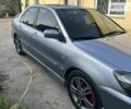 Сірий Міцубісі Lancer, об'ємом двигуна 2 л та пробігом 234 тис. км за 6000 $, фото 4 на Automoto.ua