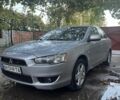 Серый Мицубиси Лансер, объемом двигателя 1.5 л и пробегом 170 тыс. км за 5013 $, фото 1 на Automoto.ua