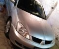 Сірий Міцубісі Lancer, об'ємом двигуна 1 л та пробігом 400 тис. км за 2850 $, фото 5 на Automoto.ua