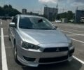 Серый Мицубиси Лансер, объемом двигателя 2 л и пробегом 249 тыс. км за 5600 $, фото 1 на Automoto.ua