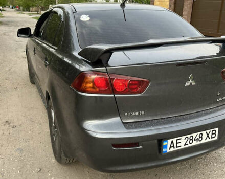 Сірий Міцубісі Lancer, об'ємом двигуна 2 л та пробігом 215 тис. км за 6900 $, фото 19 на Automoto.ua