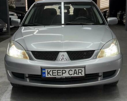 Серый Мицубиси Лансер, объемом двигателя 1.58 л и пробегом 271 тыс. км за 4200 $, фото 10 на Automoto.ua