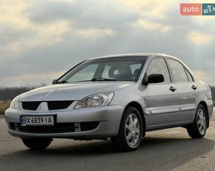 Серый Мицубиси Лансер, объемом двигателя 1.3 л и пробегом 160 тыс. км за 5555 $, фото 9 на Automoto.ua