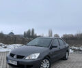 Серый Мицубиси Лансер, объемом двигателя 1.6 л и пробегом 330 тыс. км за 4000 $, фото 1 на Automoto.ua