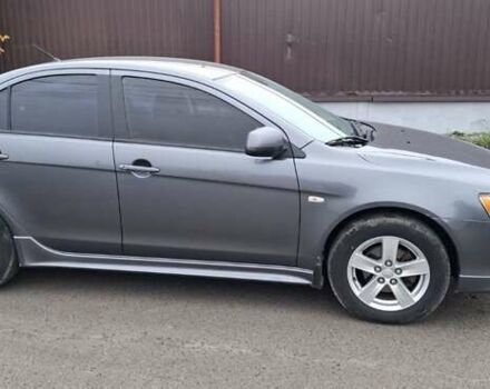 Серый Мицубиси Лансер, объемом двигателя 2 л и пробегом 189 тыс. км за 6800 $, фото 2 на Automoto.ua