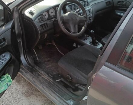 Сірий Міцубісі Lancer, об'ємом двигуна 1.6 л та пробігом 188 тис. км за 160000 $, фото 4 на Automoto.ua
