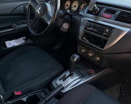Сірий Міцубісі Lancer, об'ємом двигуна 1.6 л та пробігом 174 тис. км за 4800 $, фото 6 на Automoto.ua