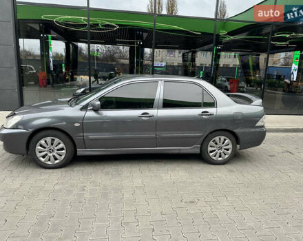 Сірий Міцубісі Lancer, об'ємом двигуна 1.6 л та пробігом 115 тис. км за 2800 $, фото 1 на Automoto.ua