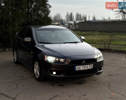 Сірий Міцубісі Lancer, об'ємом двигуна 2 л та пробігом 220 тис. км за 6800 $, фото 11 на Automoto.ua