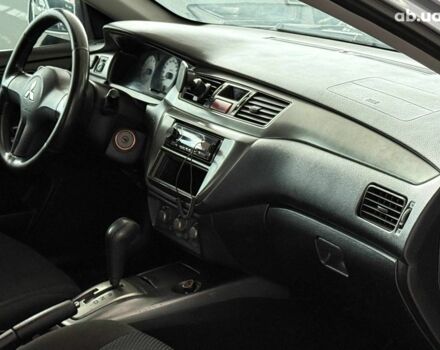 Серый Мицубиси Лансер, объемом двигателя 1.6 л и пробегом 174 тыс. км за 5990 $, фото 12 на Automoto.ua