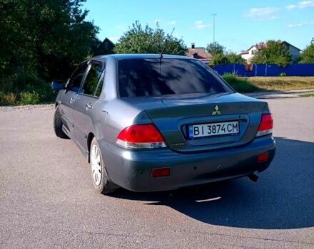 Сірий Міцубісі Lancer, об'ємом двигуна 1.6 л та пробігом 300 тис. км за 4400 $, фото 4 на Automoto.ua