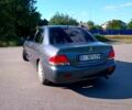 Сірий Міцубісі Lancer, об'ємом двигуна 1.6 л та пробігом 300 тис. км за 4400 $, фото 4 на Automoto.ua