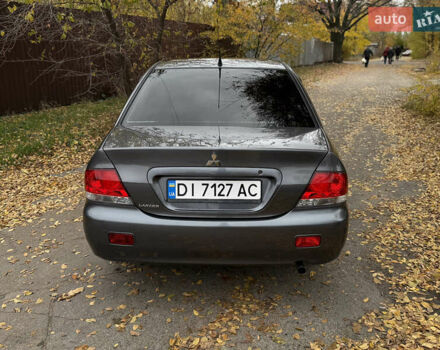 Сірий Міцубісі Lancer, об'ємом двигуна 1.58 л та пробігом 247 тис. км за 4900 $, фото 6 на Automoto.ua