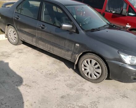 Сірий Міцубісі Lancer, об'ємом двигуна 1.6 л та пробігом 188 тис. км за 160000 $, фото 9 на Automoto.ua