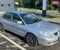 Сірий Міцубісі Lancer, об'ємом двигуна 1.58 л та пробігом 179 тис. км за 5800 $, фото 1 на Automoto.ua