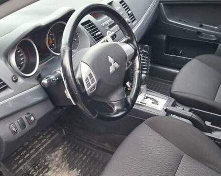 Серый Мицубиси Лансер, объемом двигателя 2 л и пробегом 189 тыс. км за 6800 $, фото 7 на Automoto.ua