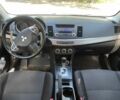 Серый Мицубиси Лансер, объемом двигателя 2 л и пробегом 260 тыс. км за 6700 $, фото 8 на Automoto.ua