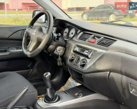 Сірий Міцубісі Lancer, об'ємом двигуна 1.3 л та пробігом 160 тис. км за 4999 $, фото 70 на Automoto.ua