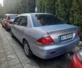 Серый Мицубиси Лансер, объемом двигателя 1.6 л и пробегом 227 тыс. км за 4300 $, фото 1 на Automoto.ua