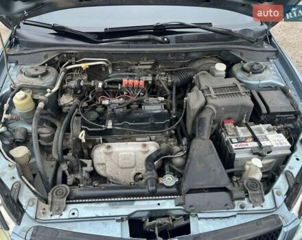 Сірий Міцубісі Lancer, об'ємом двигуна 1.58 л та пробігом 341 тис. км за 4500 $, фото 7 на Automoto.ua