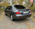 Сірий Міцубісі Lancer, об'ємом двигуна 1.58 л та пробігом 247 тис. км за 4900 $, фото 7 на Automoto.ua