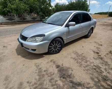 Сірий Міцубісі Lancer, об'ємом двигуна 1.58 л та пробігом 416 тис. км за 3100 $, фото 1 на Automoto.ua