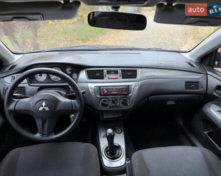 Сірий Міцубісі Lancer, об'ємом двигуна 1.58 л та пробігом 247 тис. км за 4900 $, фото 19 на Automoto.ua
