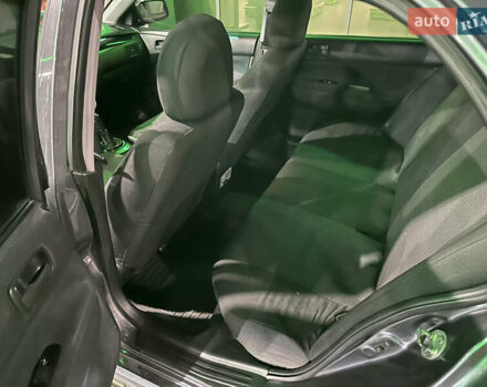 Серый Мицубиси Лансер, объемом двигателя 1.6 л и пробегом 112 тыс. км за 2800 $, фото 15 на Automoto.ua