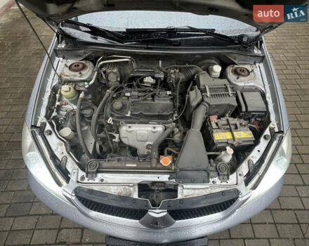 Серый Мицубиси Лансер, объемом двигателя 1.6 л и пробегом 254 тыс. км за 4500 $, фото 17 на Automoto.ua