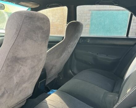 Серый Мицубиси Лансер, объемом двигателя 1.6 л и пробегом 200 тыс. км за 2300 $, фото 5 на Automoto.ua