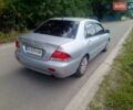 Серый Мицубиси Лансер, объемом двигателя 1.58 л и пробегом 200 тыс. км за 2300 $, фото 5 на Automoto.ua