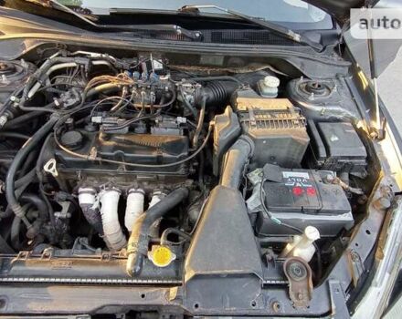 Сірий Міцубісі Lancer, об'ємом двигуна 1.6 л та пробігом 230 тис. км за 3950 $, фото 36 на Automoto.ua
