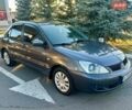Сірий Міцубісі Lancer, об'ємом двигуна 1.6 л та пробігом 176 тис. км за 3650 $, фото 1 на Automoto.ua