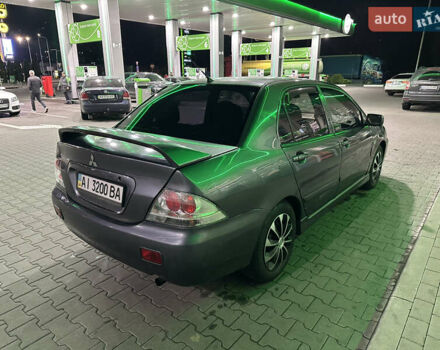 Серый Мицубиси Лансер, объемом двигателя 1.6 л и пробегом 112 тыс. км за 2800 $, фото 6 на Automoto.ua