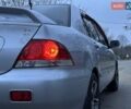 Серый Мицубиси Лансер, объемом двигателя 1.6 л и пробегом 210 тыс. км за 4600 $, фото 6 на Automoto.ua
