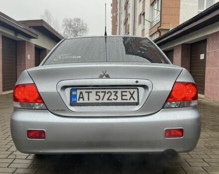 Серый Мицубиси Лансер, объемом двигателя 1.6 л и пробегом 272 тыс. км за 4500 $, фото 3 на Automoto.ua