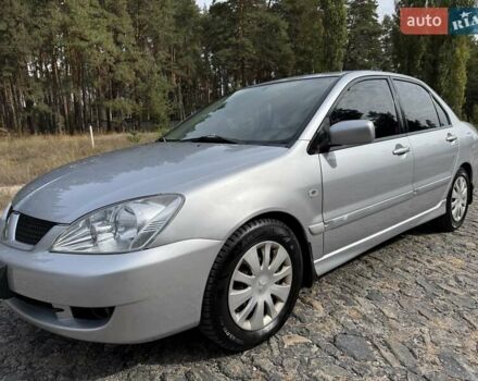 Серый Мицубиси Лансер, объемом двигателя 1.6 л и пробегом 200 тыс. км за 4400 $, фото 2 на Automoto.ua