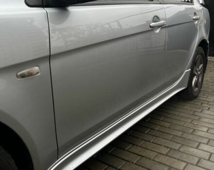 Серый Мицубиси Лансер, объемом двигателя 2 л и пробегом 227 тыс. км за 6600 $, фото 4 на Automoto.ua